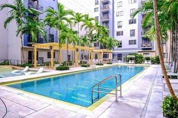 Heated, swimming pool with soaking spa and sundeck